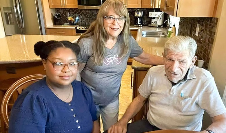 Emily Jane Crawford, a pre-med student at ASU, visits patient