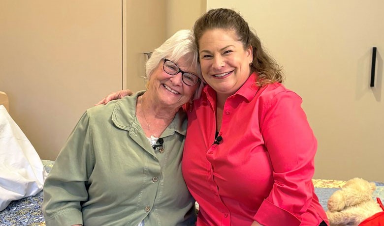 Kathy Melamed and Rebekah Wilson role-play realistic scenarios in dementia training videos.